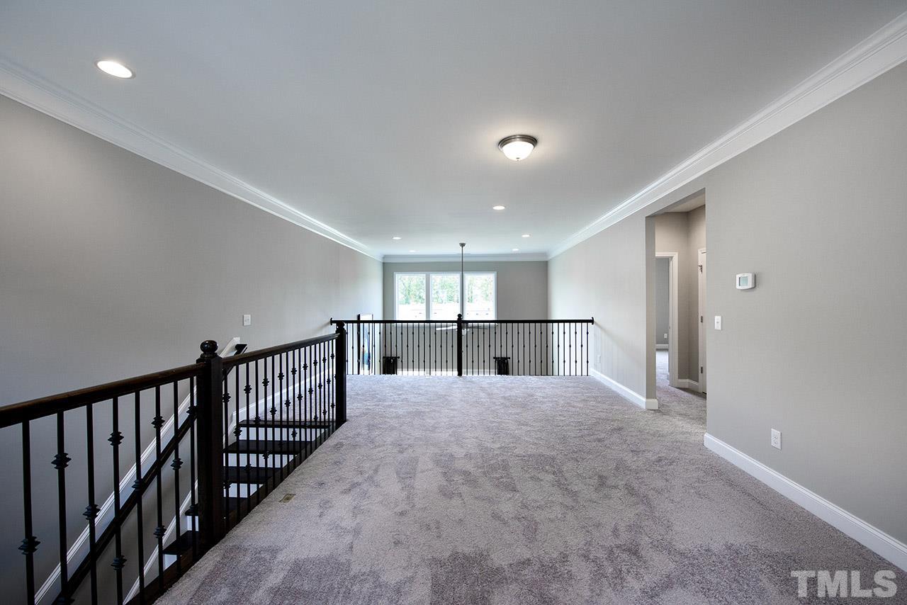 2522 Rambling Creek Road, Unit 25 Apex, NC 27523 - Photo 8 of 11 Photos are of the model home.