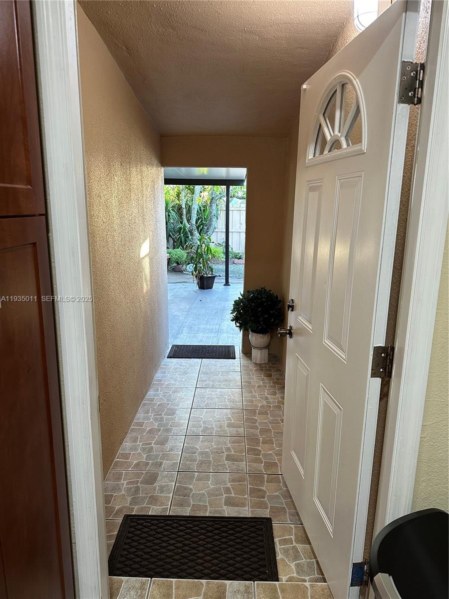 19360 Southwest 116th Avenue Miami, FL 33157 - Photo 12 of 17 a view of a hallway