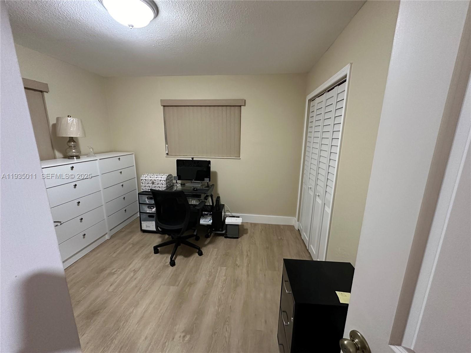 19360 Southwest 116th Avenue Miami, FL 33157 - Photo 4 of 17 a room with furniture and a window