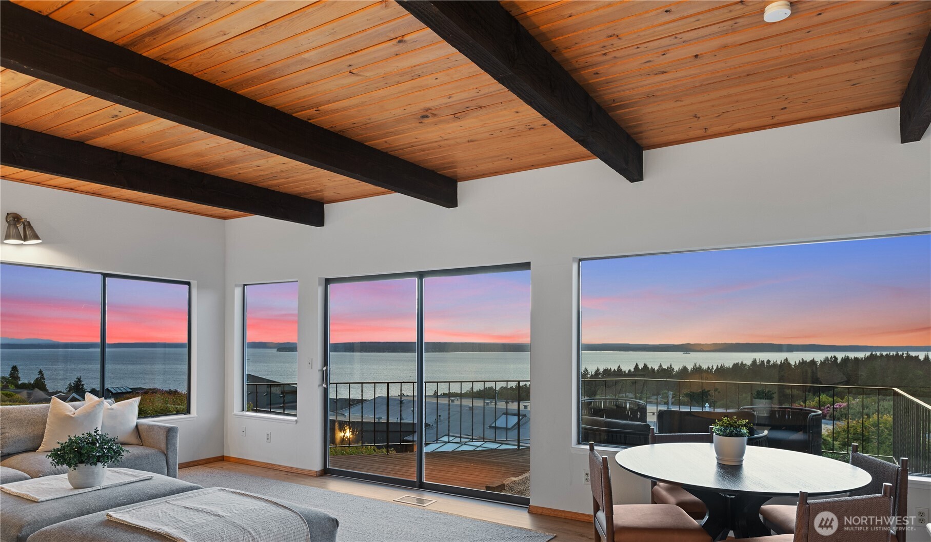 a view of a patio with a table chairs and a table