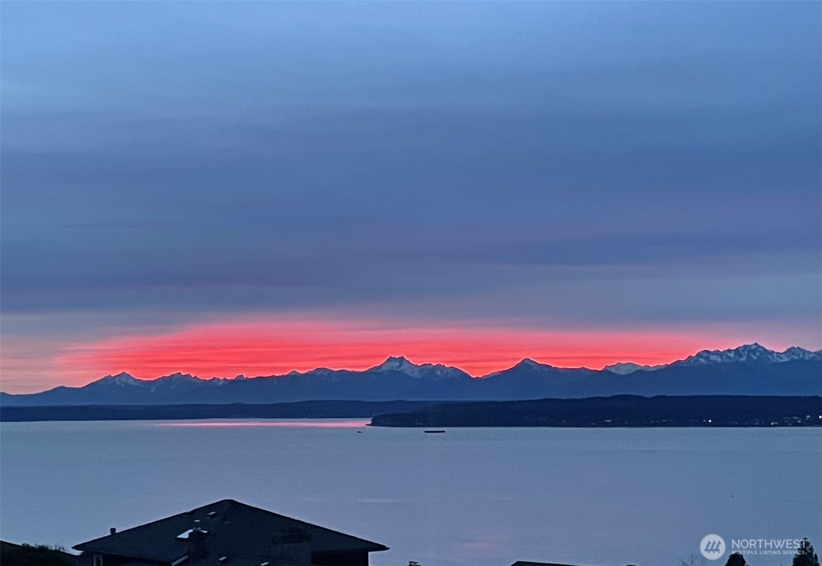 18220 Ridgefield Road Northwest Shoreline, WA 98177 - Photo 12 of 40 a view of an ocean and a mountain
