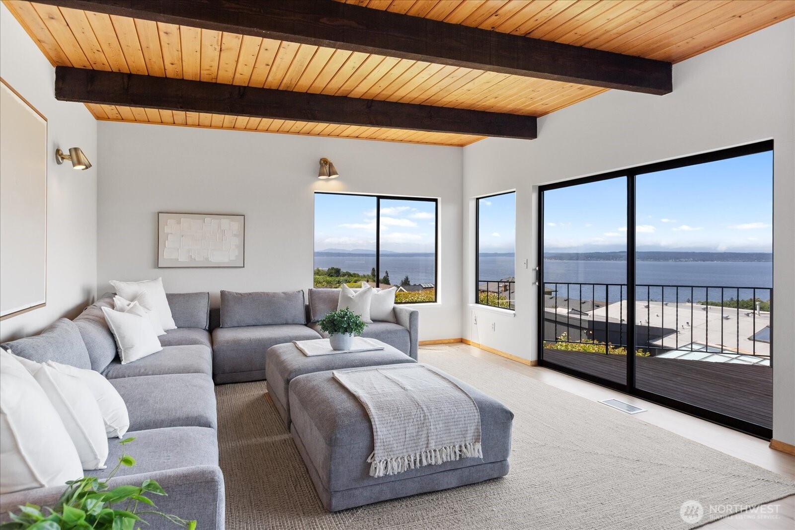 18220 Ridgefield Road Northwest Shoreline, WA 98177 - Photo 24 of 40 a large bedroom with a large bed and a large window