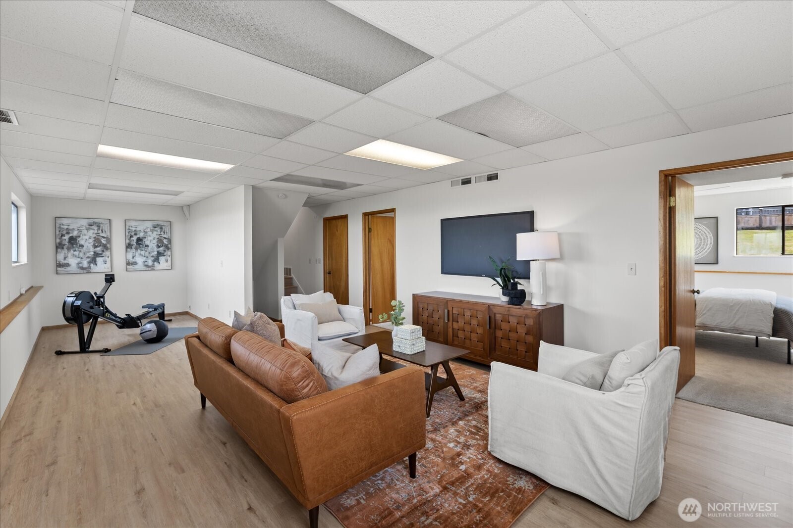 18220 Ridgefield Road Northwest Shoreline, WA 98177 - Photo 31 of 40 a living room with furniture and a large window