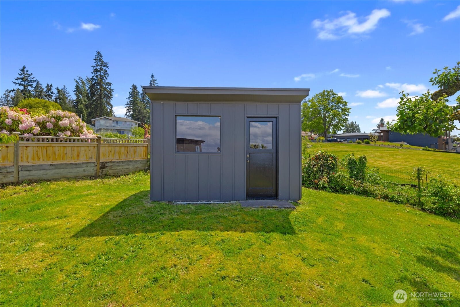 18220 Ridgefield Road Northwest Shoreline, WA 98177 - Photo 35 of 40 a view of a garden with an outdoor space