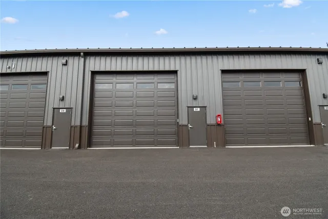 a view of swimming pool with outdoor seating and plants