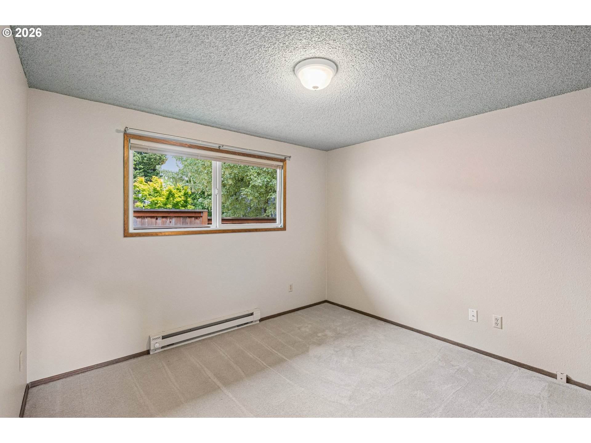 255 West Berkeley Street Gladstone, OR 97027 - Photo 23 of 37 a view of an empty room with a window