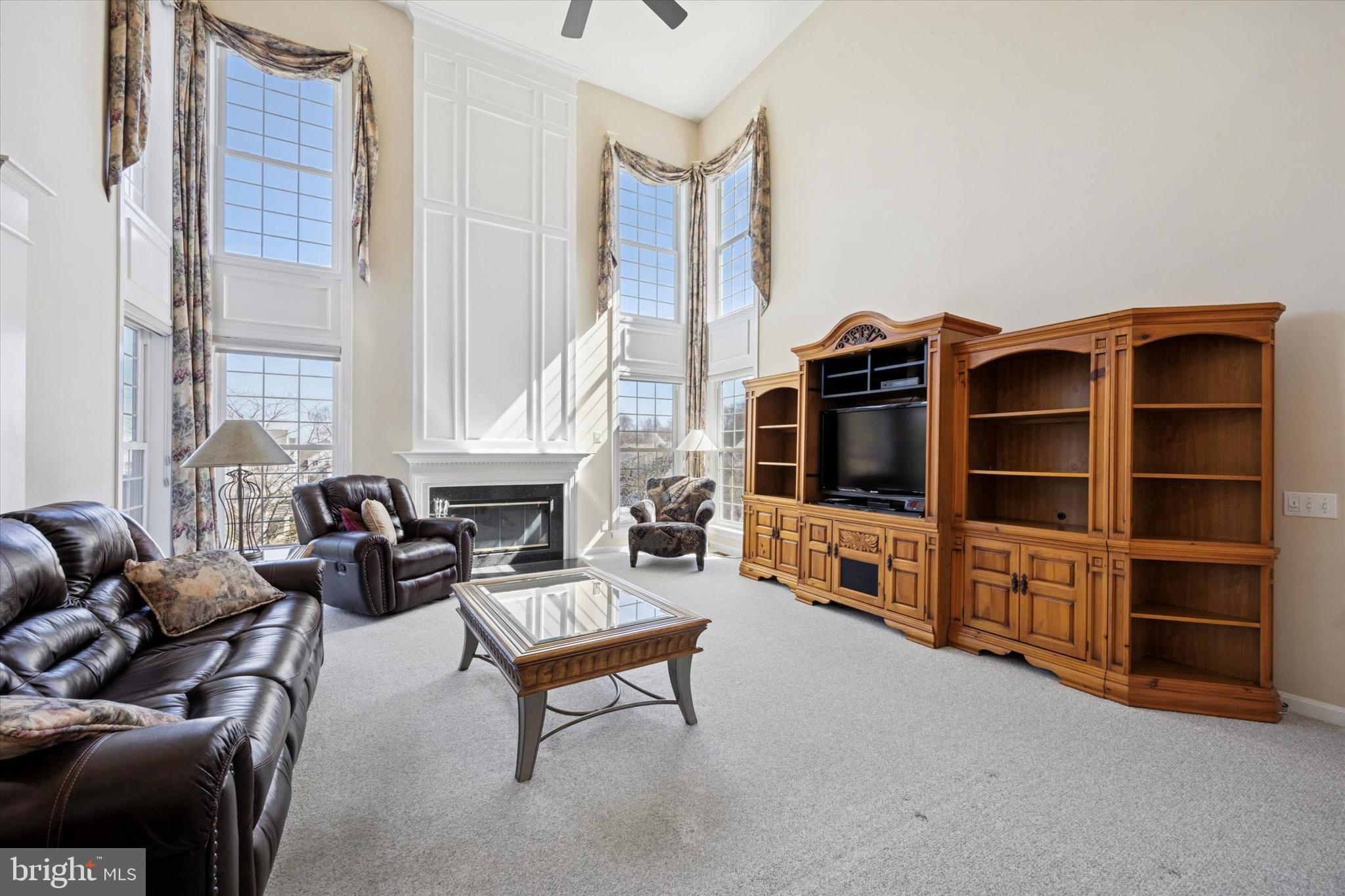 128 Applegate Drive West Chester, PA 19382 - Photo 11 of 36 a living room with furniture and a flat screen tv
