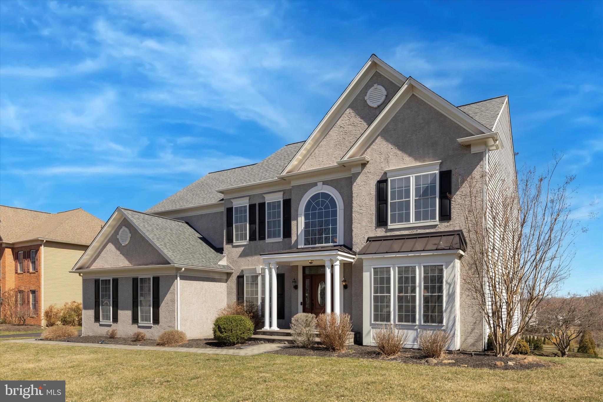 128 Applegate Drive West Chester, PA 19382 - Photo 2 of 36 a front view of a house with a yard