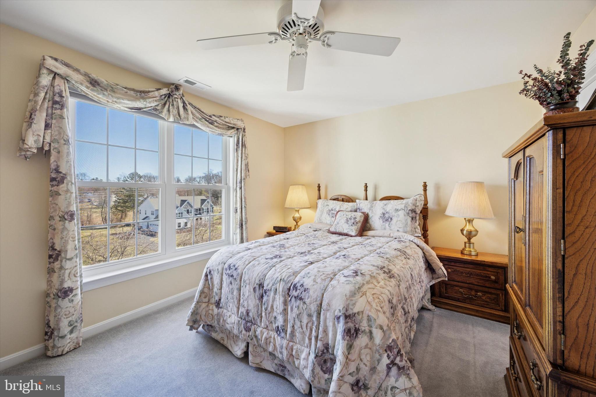 128 Applegate Drive West Chester, PA 19382 - Photo 23 of 36 a bedroom with a bed and a window