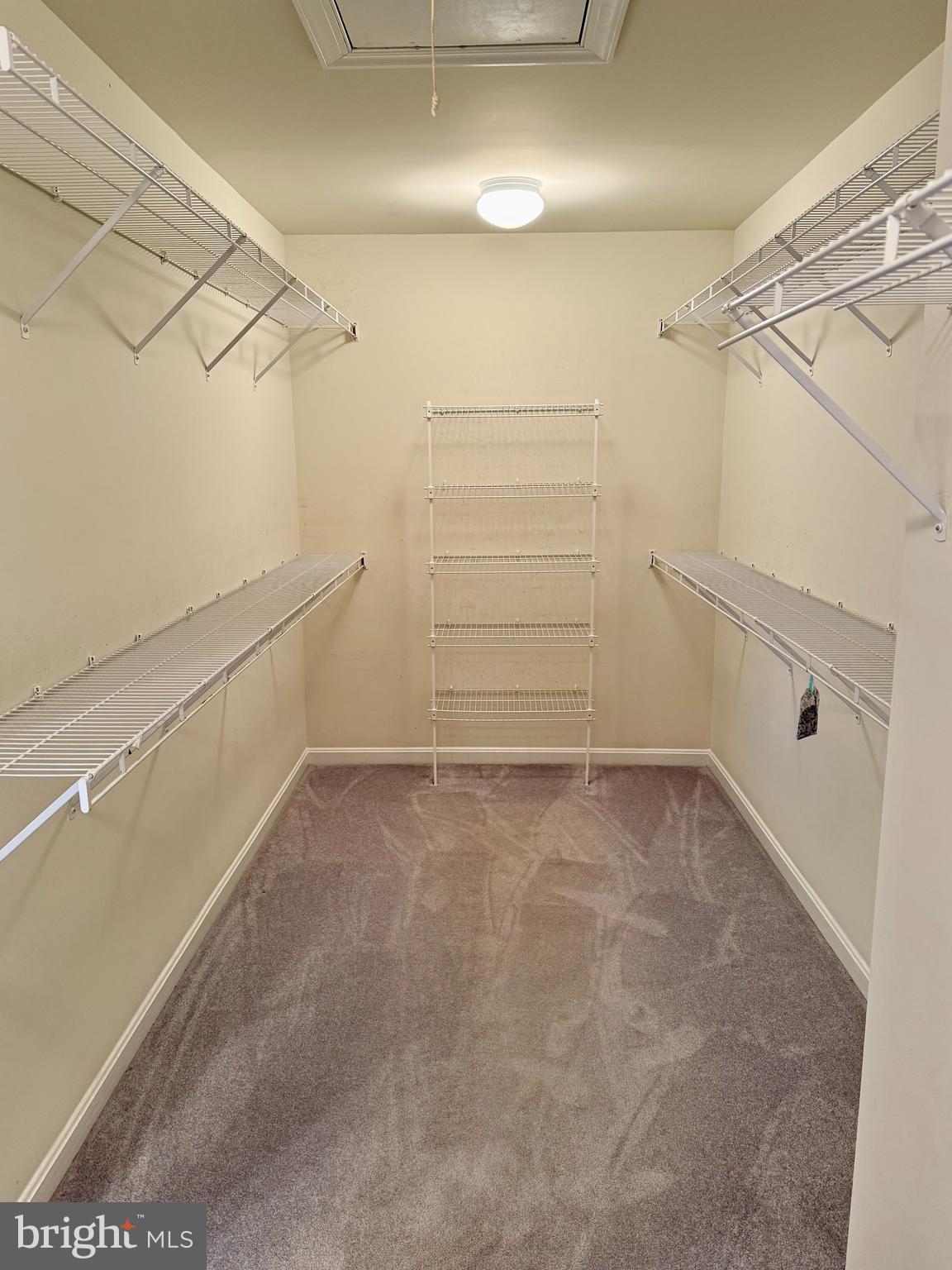 128 Applegate Drive West Chester, PA 19382 - Photo 31 of 36 a view of a room with racks on the wall