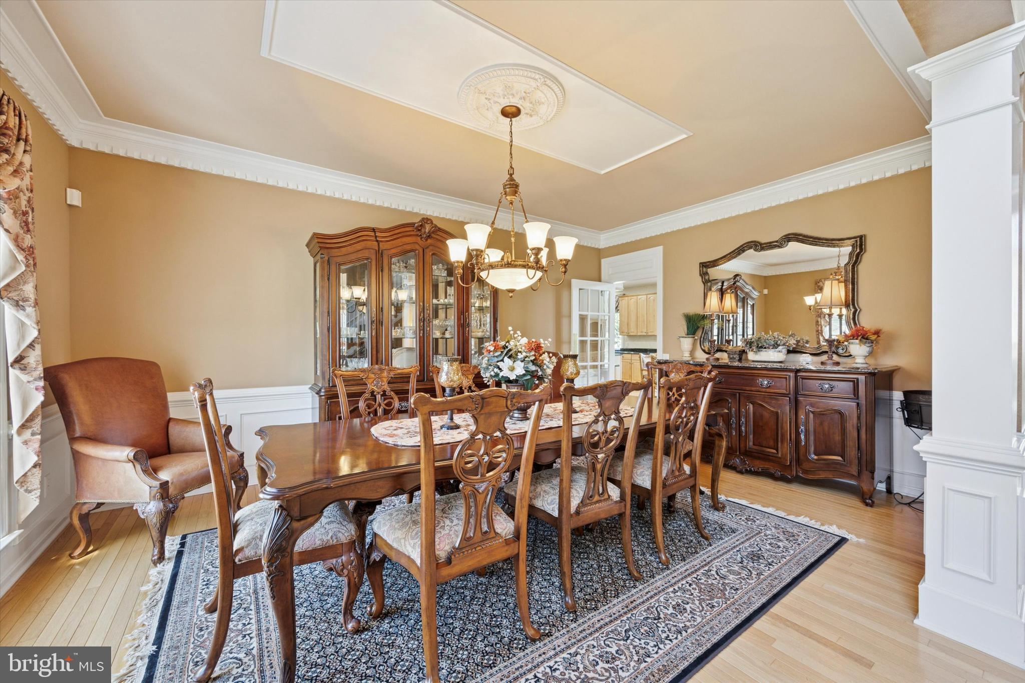 128 Applegate Drive West Chester, PA 19382 - Photo 5 of 36 a view of a dining room with furniture and wooden floor