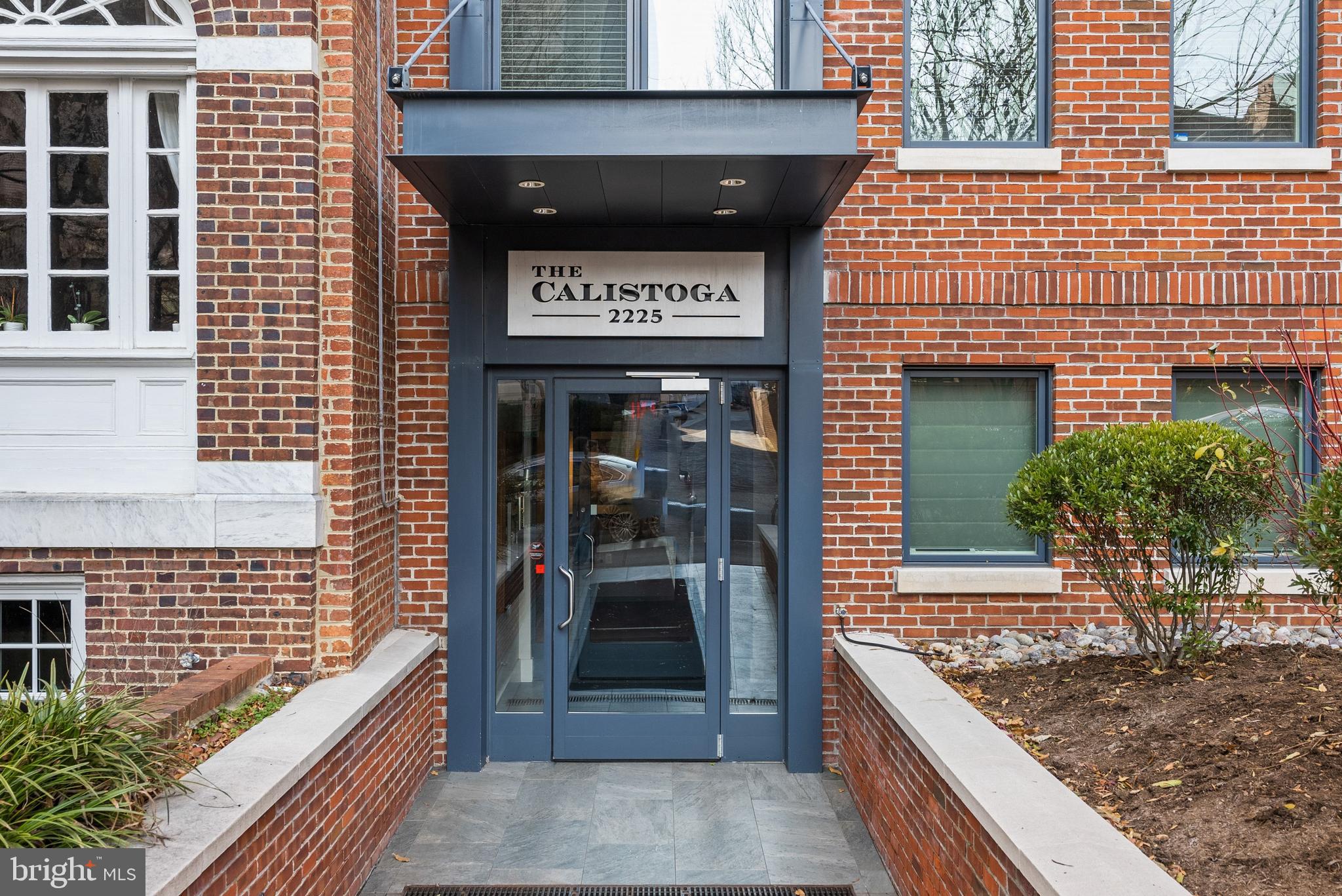 2225 California Street Northwest, Unit PH1 Washington, DC 20008 - Photo 2 of 31 a sign on the wall of building