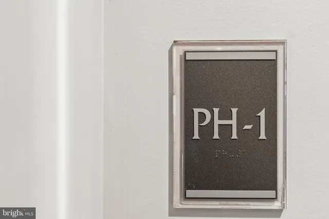 a sign on the wall of building