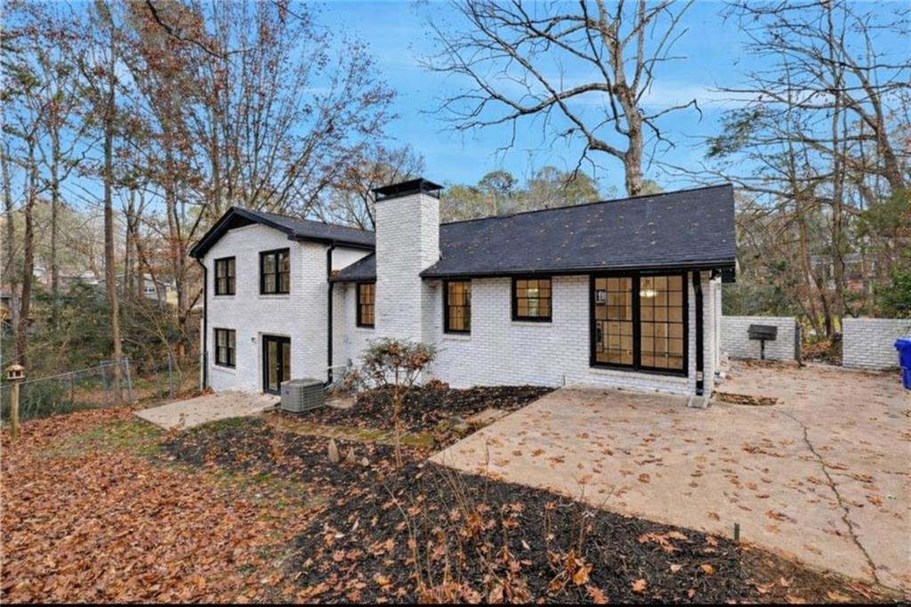 2520 Overlook Way Northeast Atlanta, GA 30345 - Photo 31 of 31 a front view of a house with a yard