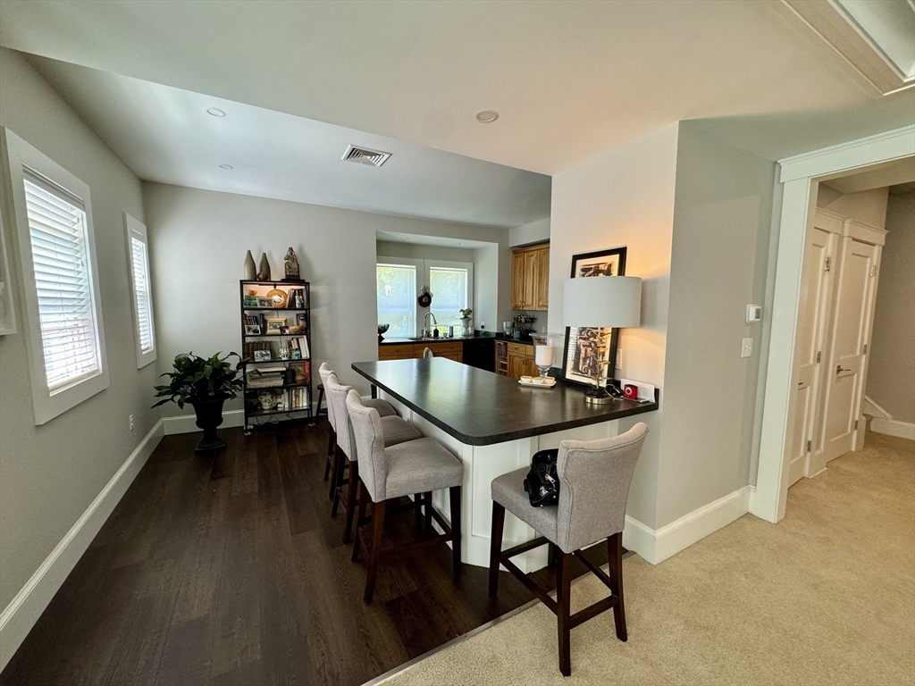 32 Atherton Road, Unit 2 Brookline, MA 02446 - Photo 2 of 42 a dining room with furniture and window