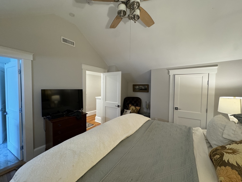 32 Atherton Road, Unit 2 Brookline, MA 02446 - Photo 38 of 42 a bed room with a bed a television and a television