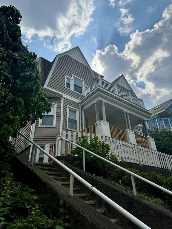 32 Atherton Road, Unit 2 Brookline, MA 02446 - Photo 39 of 42 a front view of a house with balcony