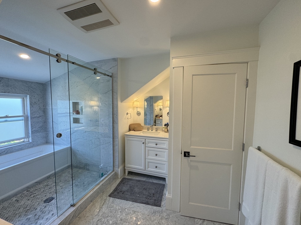 32 Atherton Road, Unit 2 Brookline, MA 02446 - Photo 6 of 42 a bathroom with a shower and a sink