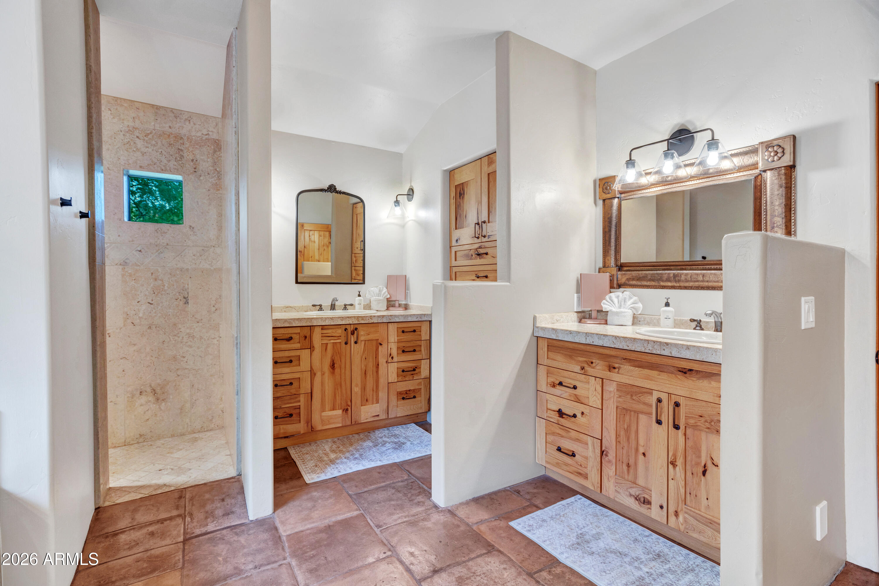 55 Ranch House Circle Sedona, AZ 86336 - Photo 36 of 61 a bathroom with a granite countertop sink a vanity and a mirror