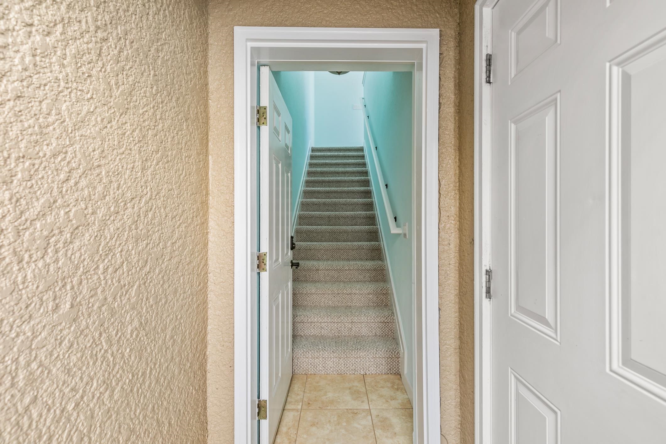 654 Market Street St. Augustine, FL 32095 - Photo 27 of 52 a view of a hallway with stairs