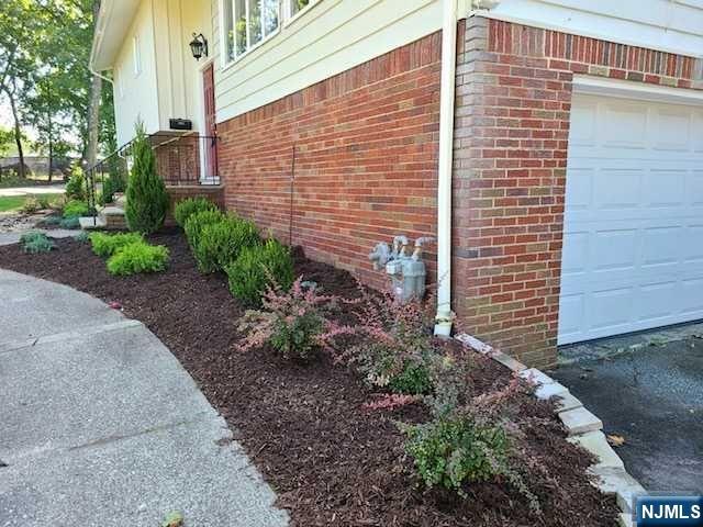 32 Rock Road Englewood Cliffs, NJ 07632 - Photo 2 of 30 a view of a pathway with a house