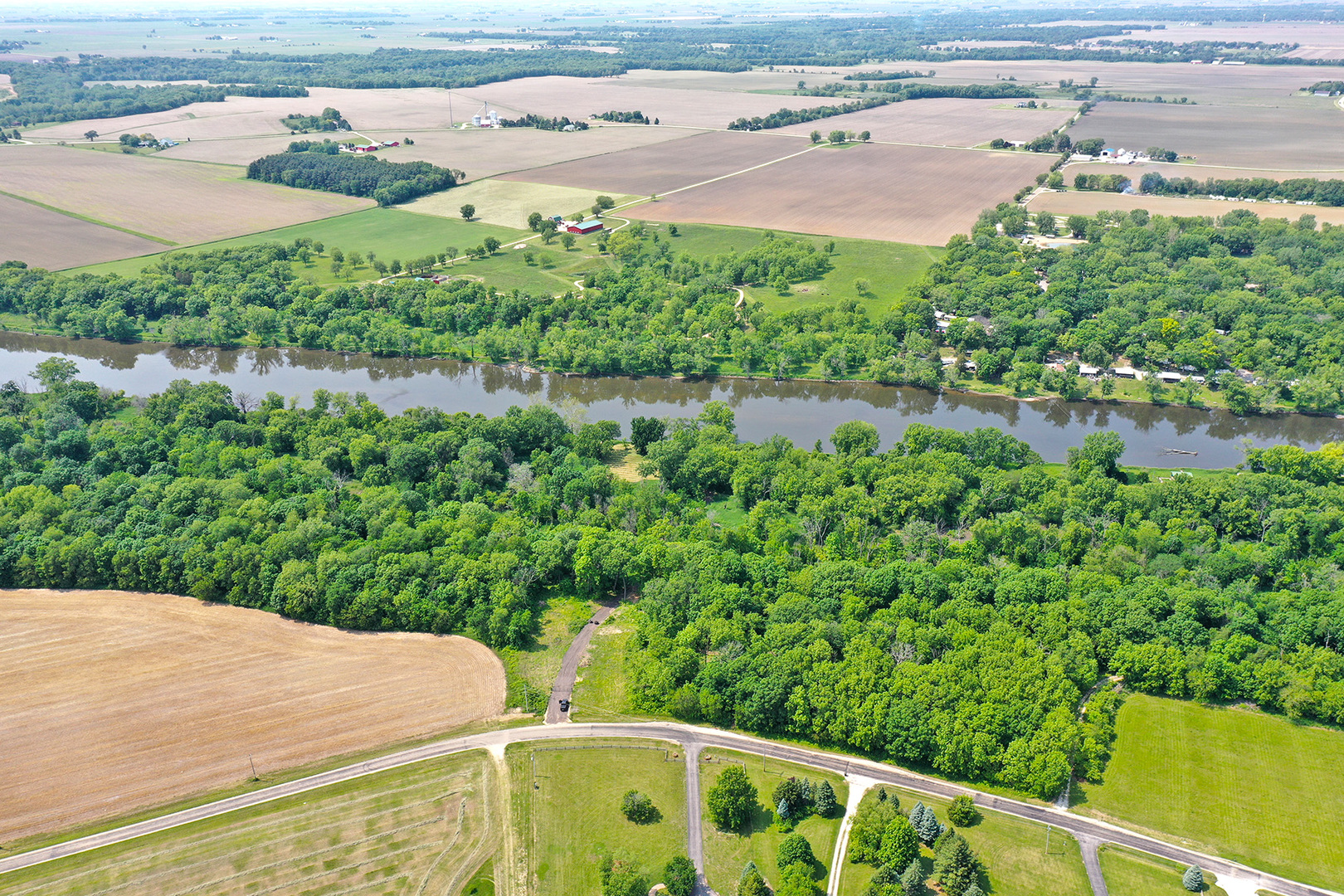 3 North 4201st Road Sheridan, IL 60551 - Photo 7 of 9 a view of a garden with a lake