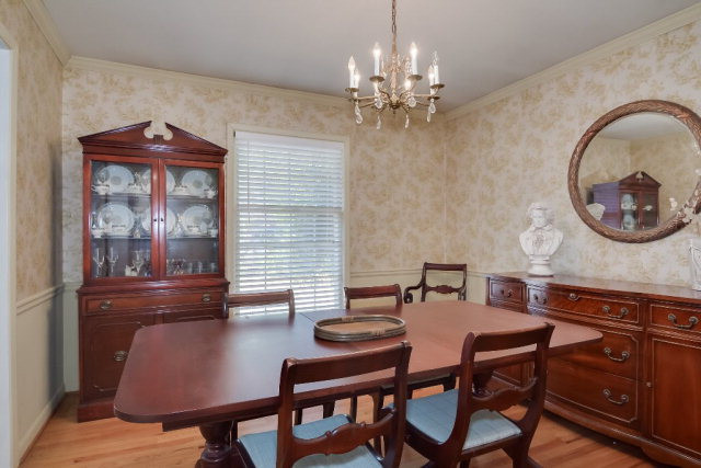 13 Burgundy Road Aiken, SC 29801 - Photo 6 of 23 a view of a dining room with furniture and chandelier