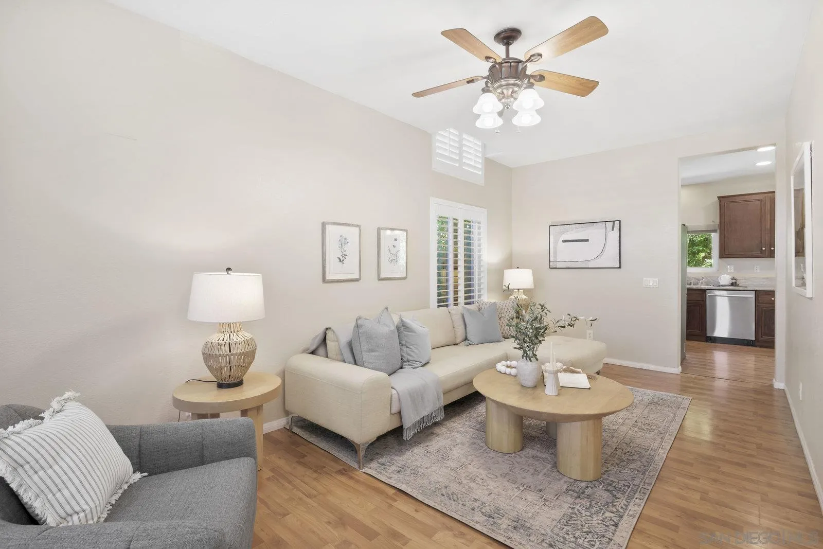 a living room with furniture and a table