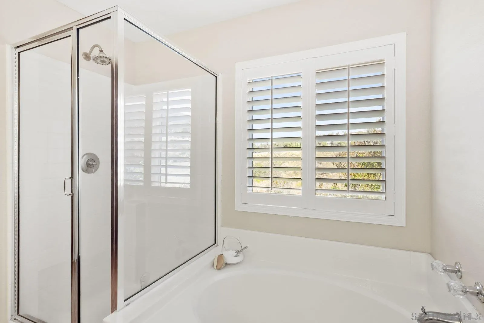 1385 Sunhaven Road Alpine, CA 91901 - Photo 11 of 32 a bathroom with a bathtub and a shower