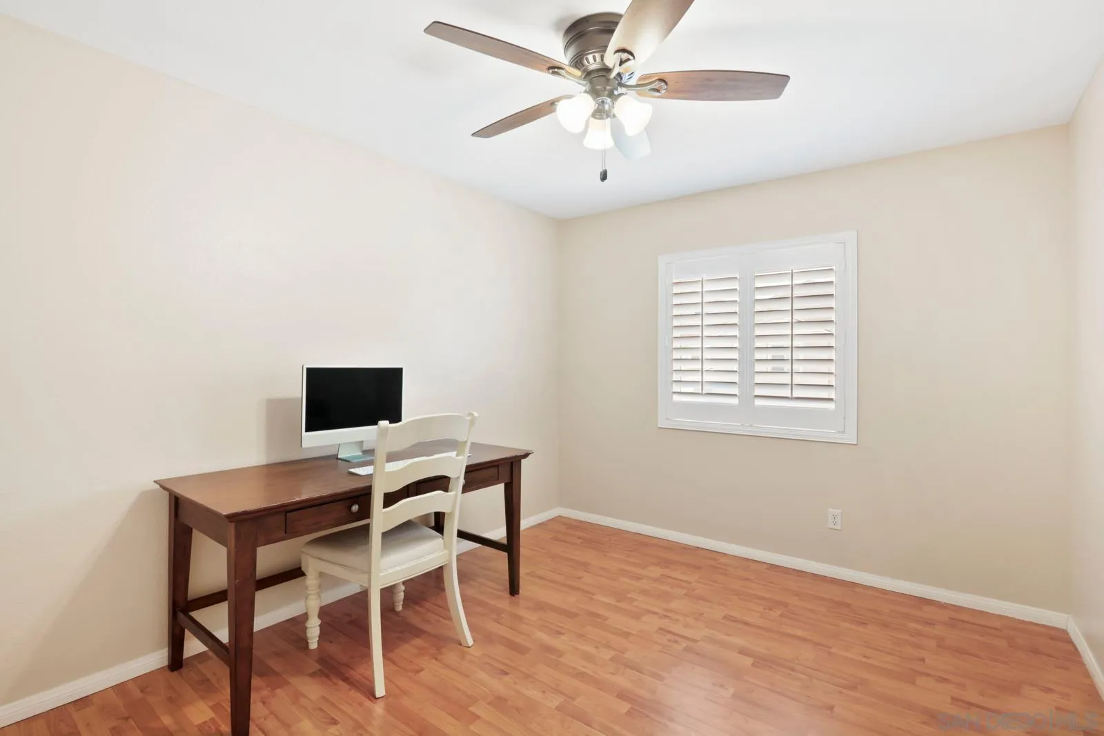 1385 Sunhaven Road Alpine, CA 91901 - Photo 18 of 32 a workspace with wooden floor and a window