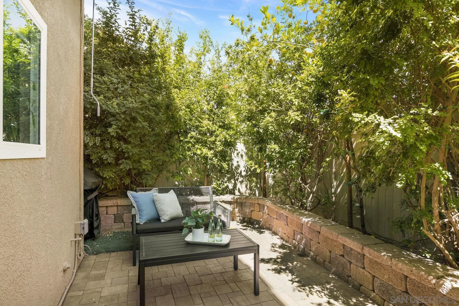 1385 Sunhaven Road Alpine, CA 91901 - Photo 22 of 32 a view of a porch with furniture and a yard