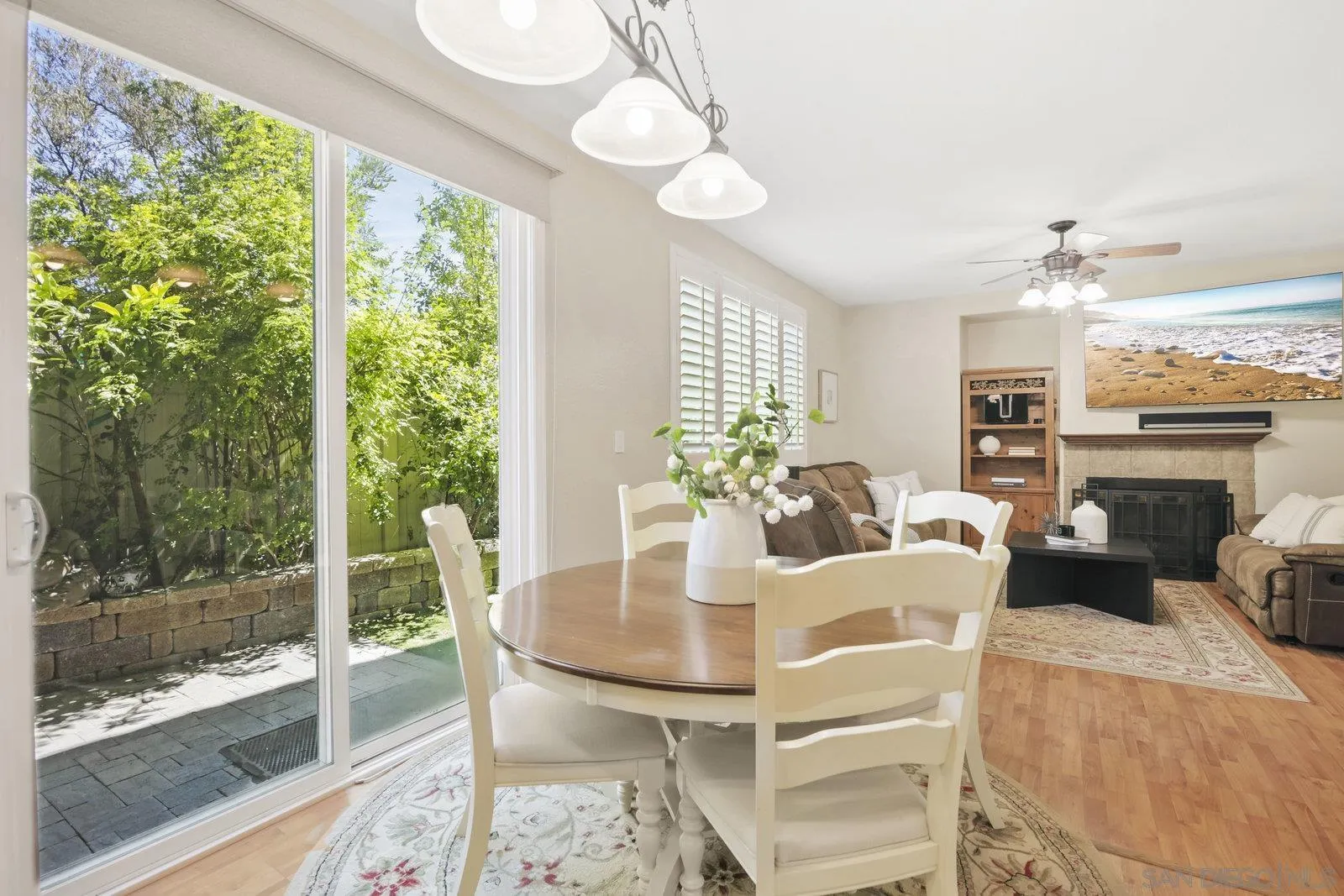 1385 Sunhaven Road Alpine, CA 91901 - Photo 5 of 32 a view of a dining room with furniture window and wooden floor