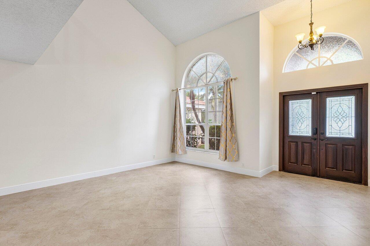 10934 Crescendo Circle Boca Raton, FL 33498 - Photo 6 of 59 Front Door/Formal Living