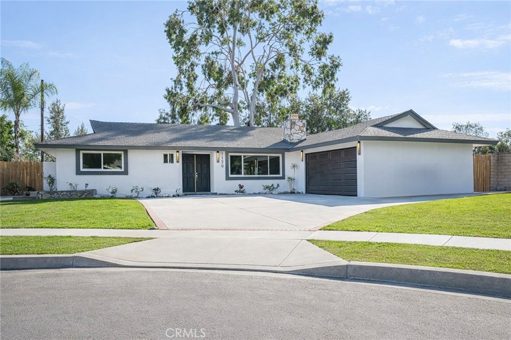 1120 Sesmas Street Monrovia, CA 91016 - Photo 1 of 1 a view of a house with a backyard and a garage