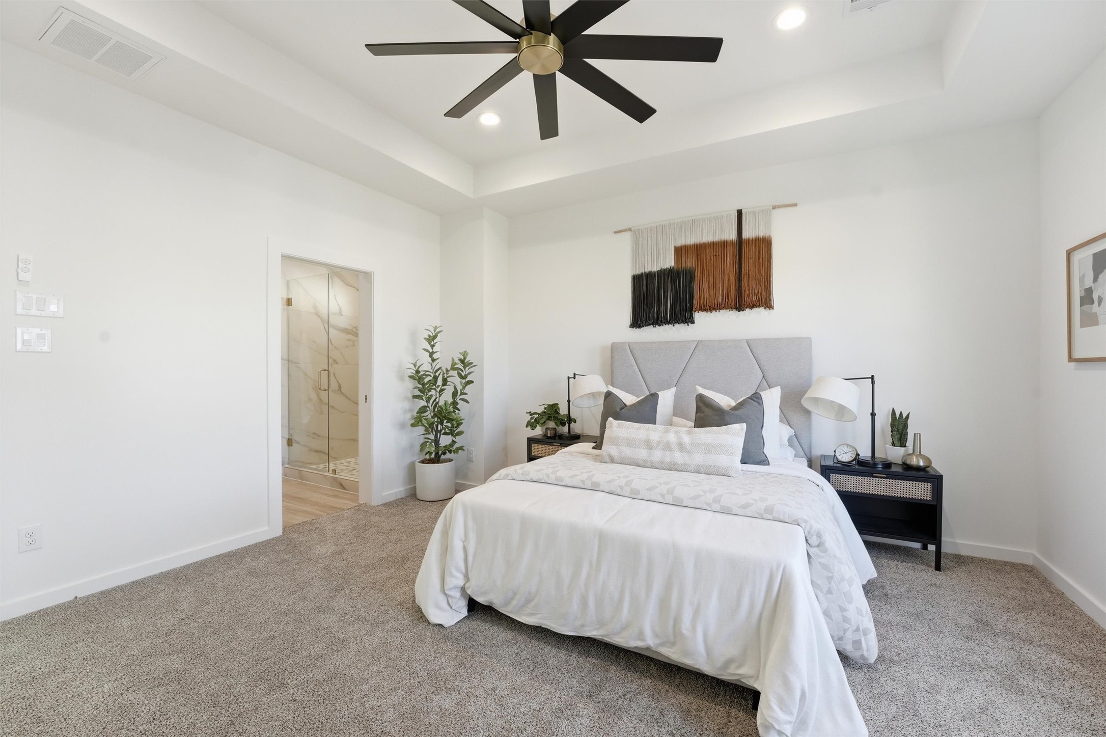 528 North 4th Street La Porte, TX 77571 - Photo 15 of 27 a bedroom with a bed and ceiling fan