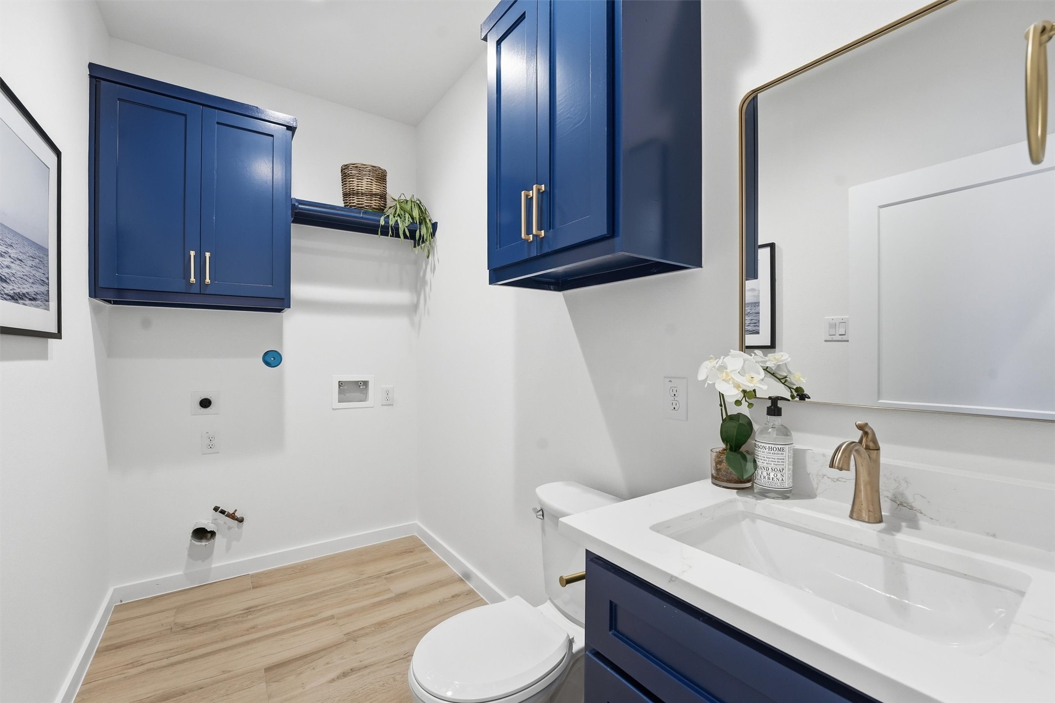 528 North 4th Street La Porte, TX 77571 - Photo 24 of 27 a bathroom with a sink vanity granite and toilet