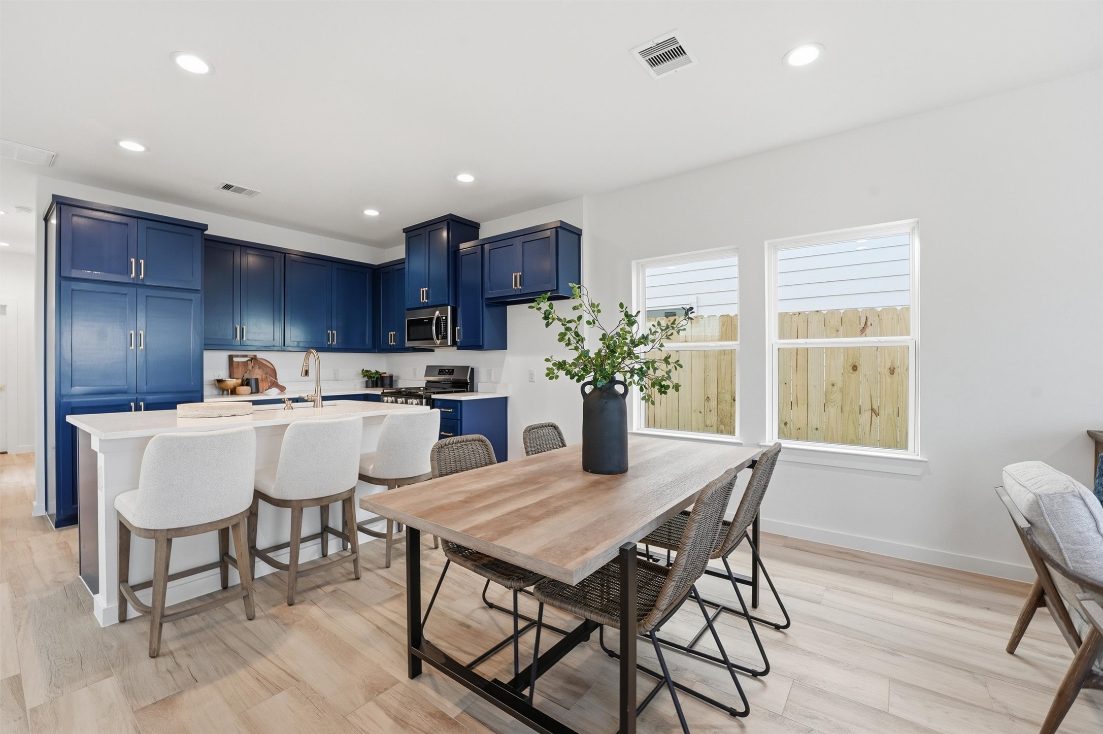 528 North 4th Street La Porte, TX 77571 - Photo 9 of 27 a view of a dining room with furniture and a potted plant