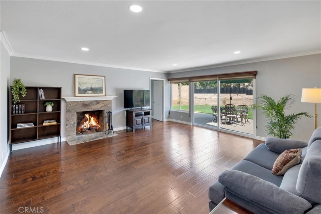 2232 Montague Circle Placentia, CA 92870 - Photo 12 of 36 a living room with furniture and a fireplace