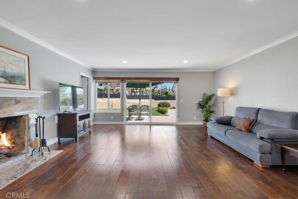 2232 Montague Circle Placentia, CA 92870 - Photo 13 of 36 a living room with furniture and a fireplace