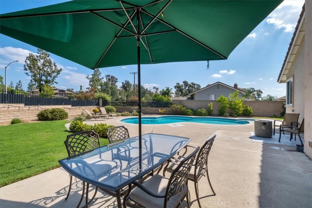 2232 Montague Circle Placentia, CA 92870 - Photo 29 of 36 a patio with a yard table and chairs