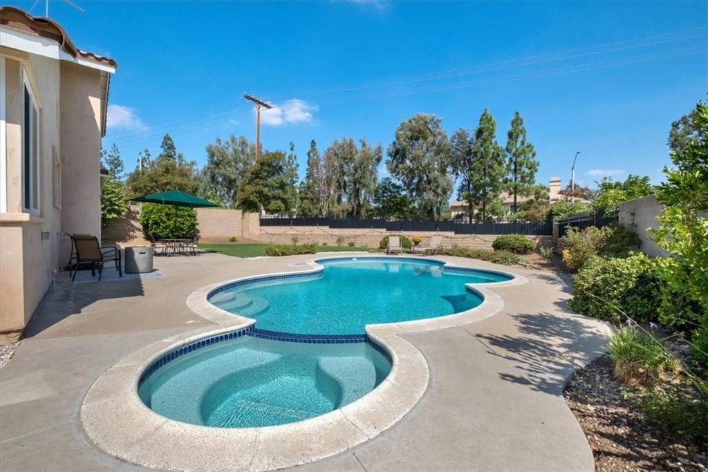 2232 Montague Circle Placentia, CA 92870 - Photo 30 of 36 a view of a swimming pool with a yard