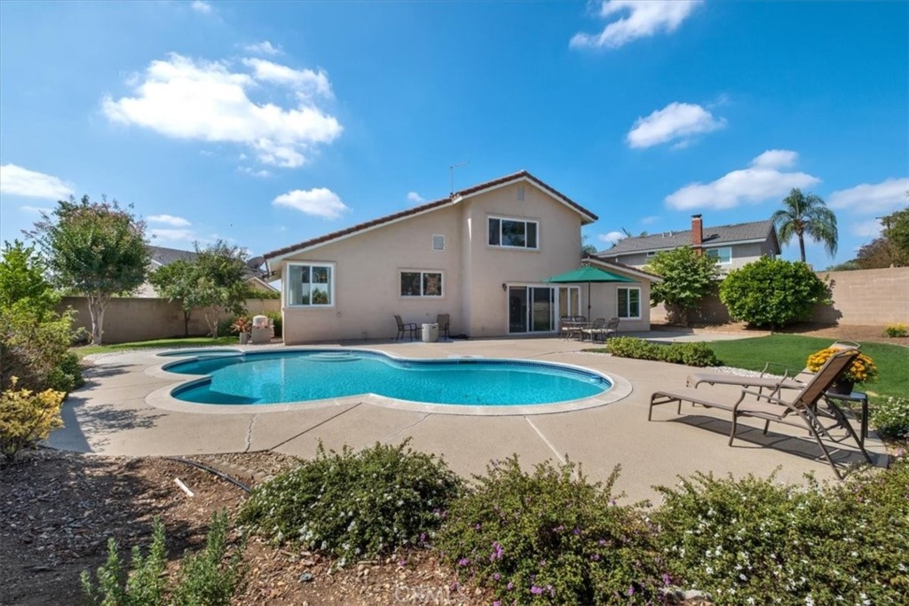 2232 Montague Circle Placentia, CA 92870 - Photo 31 of 36 a view of a house with backyard and swimming pool
