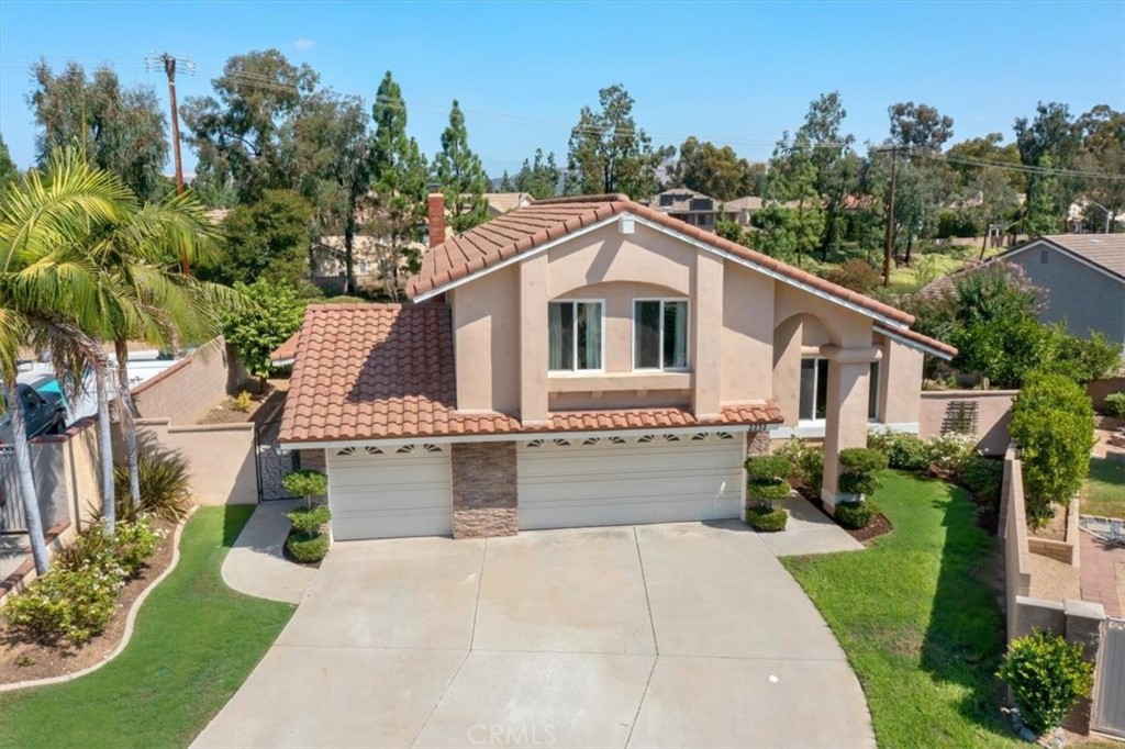 2232 Montague Circle Placentia, CA 92870 - Photo 32 of 36 a front view of a house with a yard