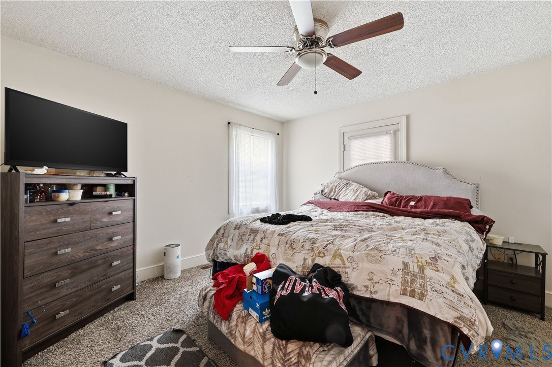 161 Lakeview Park Road Colonial Heights, VA 23834 - Photo 15 of 20 a bedroom with a bed and a flat screen tv