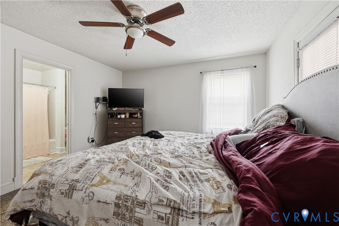 161 Lakeview Park Road Colonial Heights, VA 23834 - Photo 16 of 20 a bedroom with a bed and a tv