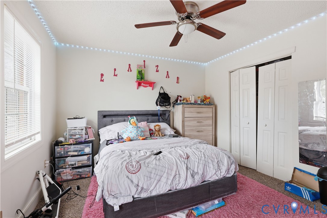 161 Lakeview Park Road Colonial Heights, VA 23834 - Photo 20 of 20 a bedroom with a bed dresser and a window