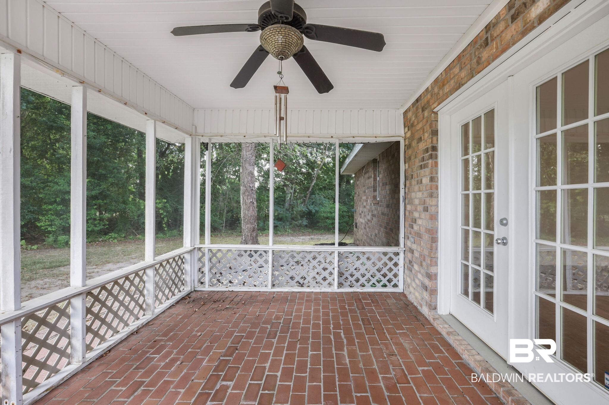 18620 Hammond Street Robertsdale, AL 36567 - Photo 18 of 23 Unfurnished sunroom featuring ceiling fan