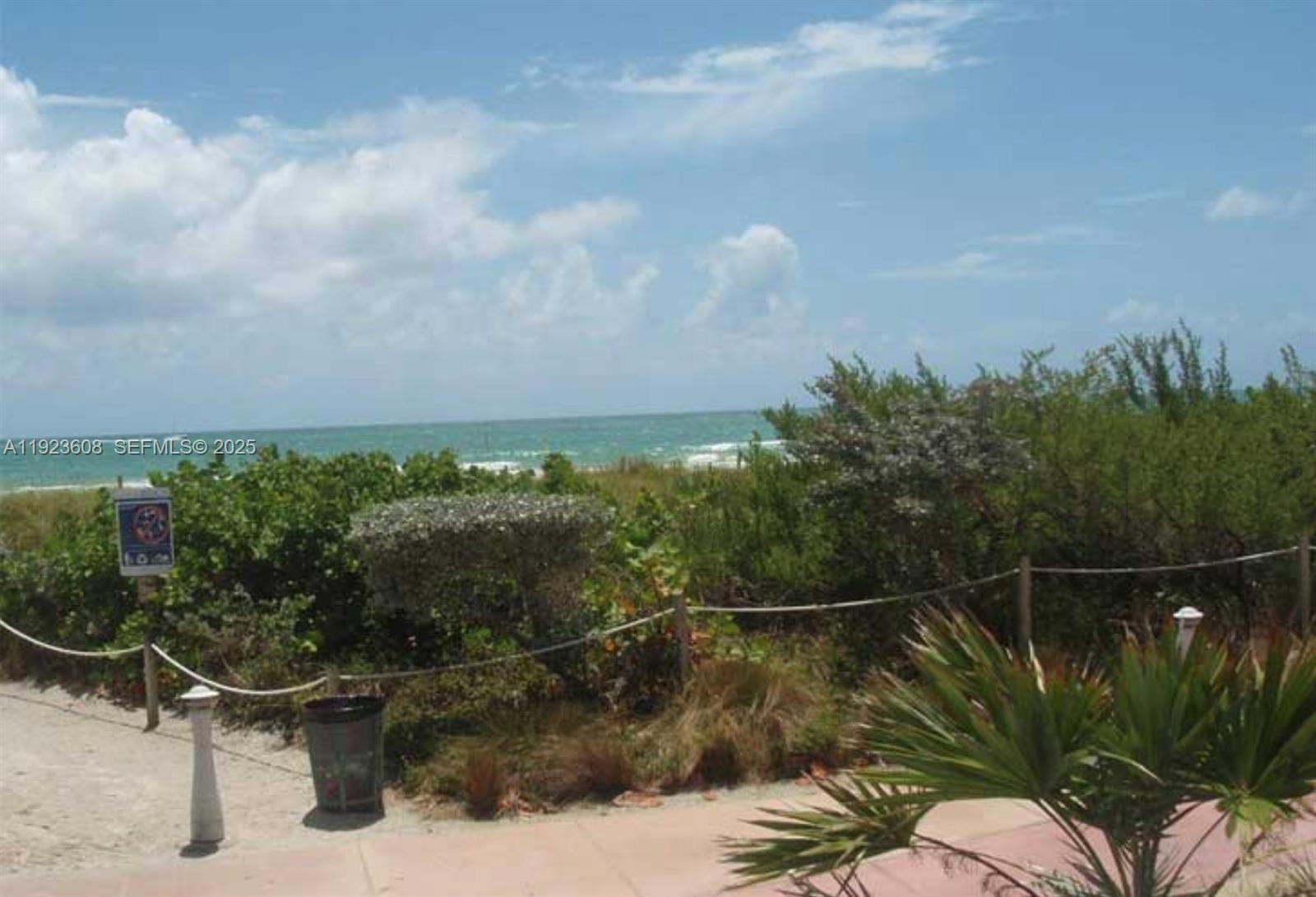 6969 Collins Avenue, Unit 903 Miami Beach, FL 33141 - Photo 18 of 18 a view of a balcony with outdoor seating
