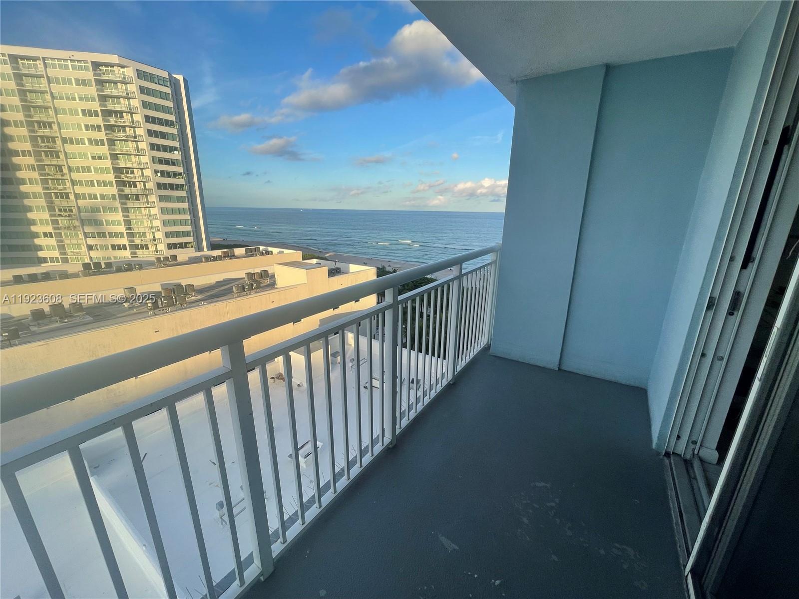 6969 Collins Avenue, Unit 903 Miami Beach, FL 33141 - Photo 2 of 18 a view of a balcony