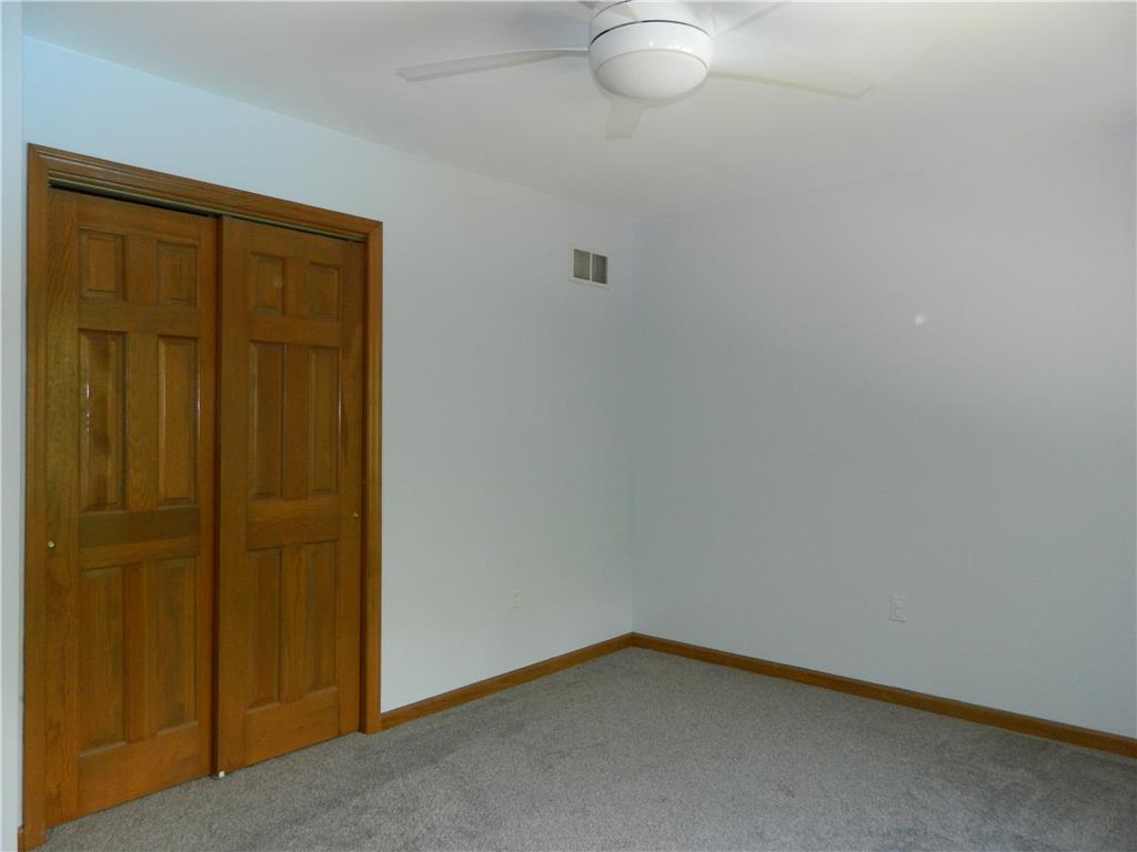 328 Pin Oak Road Stroudsburg, PA 18360 - Photo 30 of 37 Well-lit sleeping quarters with a built-in closet and soft carpet.